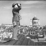 aircraft spotter on the roof of a building in london with saint pauls cathedral e3dac1